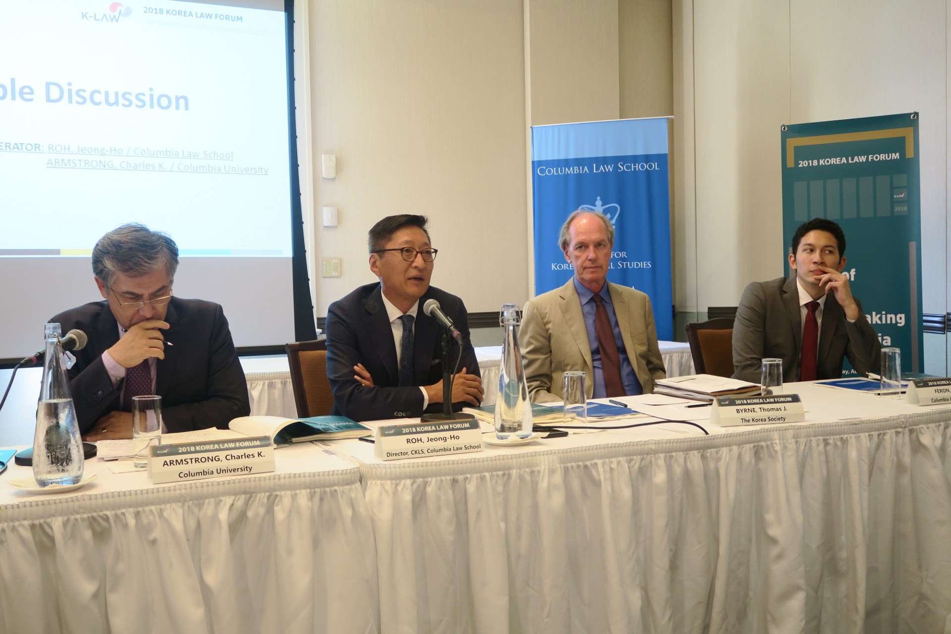 Charles Armstrong, Columbia University; Jeong-Ho Roh, CKLS; Thomas Byrne, The Korea Society; Henri Féron, CKLS People sitting at a table