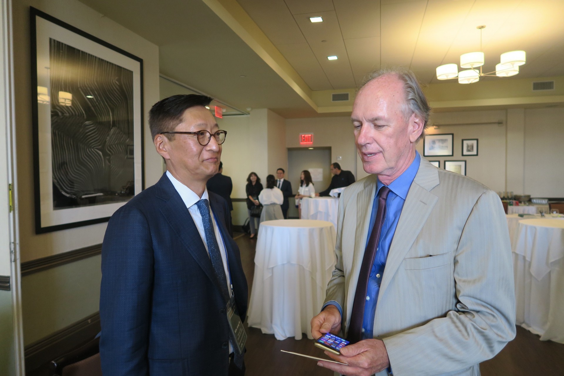 Jeong-Ho Roh, CKLS; Thomas Byrne, The Korea Society Men talking