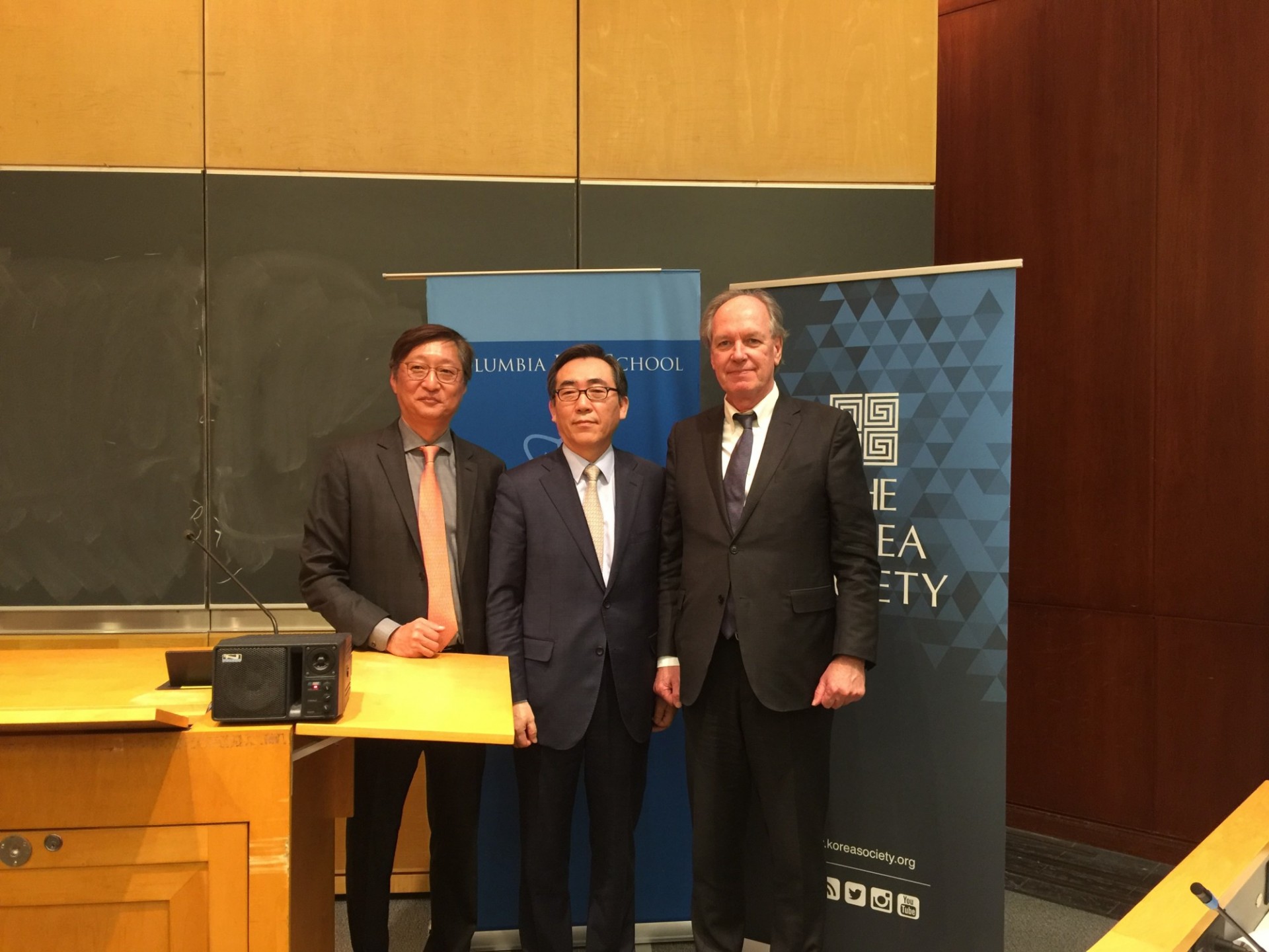 Jeong-Ho Roh, Director, CKLS; Ambassador Cho Tae-yul; Thomas Byrne, Executive Director, The Korea Society Men gathered
